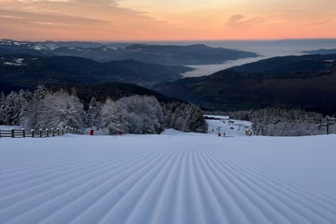 a ski slope with a ski slope and a ski lift