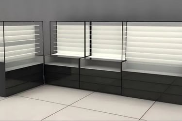 Modern optical display cases with black cabinetry and backlit shelves for retail stores.
