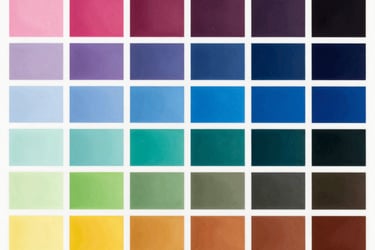 A vibrant color palette grid showing a variety of rainbow swatches for design inspiration.