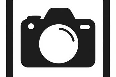Black and white minimalist camera icon inside a rounded square border for digital photography.