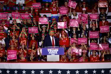 Trump Rally with "Women For Trump" signs held up in a crowd of women