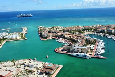 Luxury yachts and waterfront resorts at Marina Cap Cana, Dominican Republic