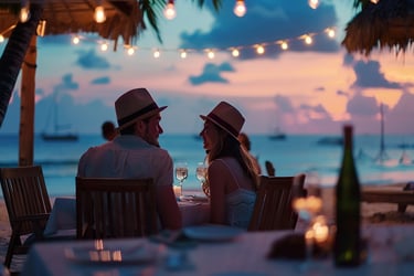 Romantic beachfront dinner in the Dominican Republic with wine, candlelight, and Caribbean sunset views