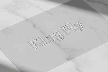 A high-end custom cosmetic pouch placed on a desk next to a business report.