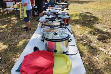 chili cook off crock pots on a table