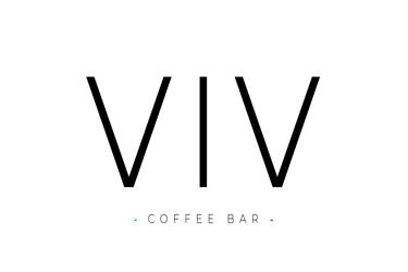 a man in a suit and tie is holding a microphone