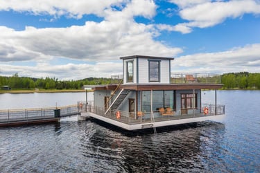 a houseboater's floating houseboat on a lake
