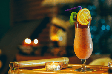 a cocktail with a glass of wine and a bottle of wine