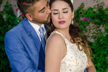 a man and woman in a blue suit and tie