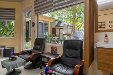 a living room with a view of a bathroom