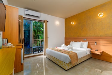 Cozy standard guest room in Nala Veli Maldives with soft linens