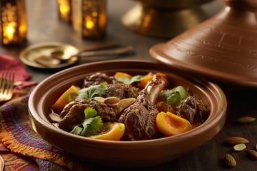 a bowl of food with a fork and spoon