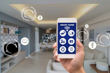 a person holding a smart phone in their hand