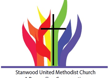 a church with a cross and a cross on the front of it