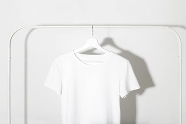 A white shirt on a hanger | fashion translation