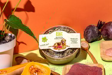 a table with a bowl of food and a plant in a pot