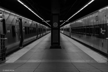 metro north train station with a clock on the platform