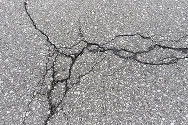 Asphalt crack before being repaired