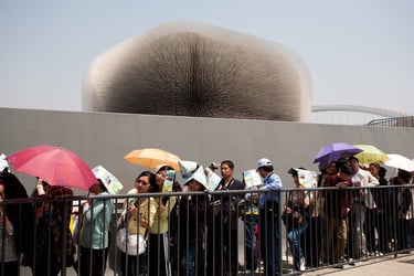 Visitors queue in sweltering Shanghai heat at the UK Pavilion at the Shanghai Expo