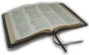 Opened black Bible with black ribbon book markers