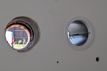 holes done and one with vent trim in place
