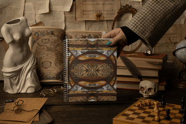 a person holding a book with a bookmark on it