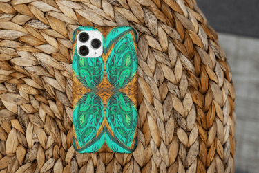 a phone case with a green butterfly on it