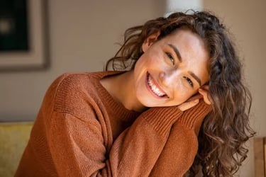 woman posing with a big smile on her face