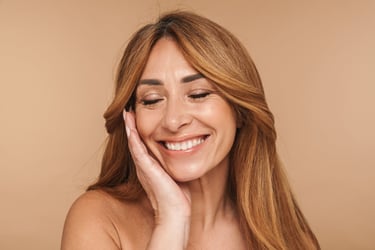 woman posing with a big smile on her face