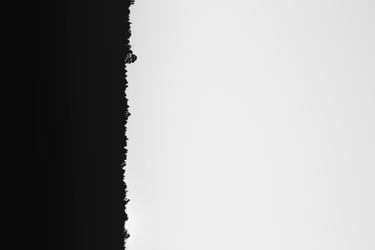 background image - contrasty black and white image of land and sky