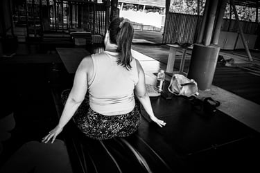 Woman practising a seated yoga pose