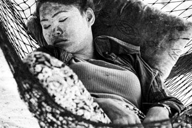 Bajau Laut, Sabah. Woman sleeping in a hammock