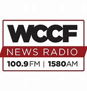 a radio station with a red ribbon around it