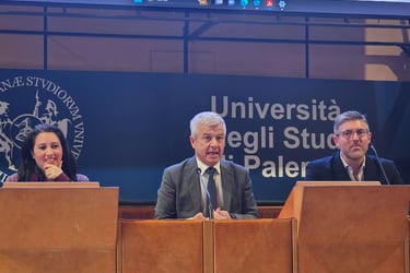 The Rector of the University of Palermo is giving speech.