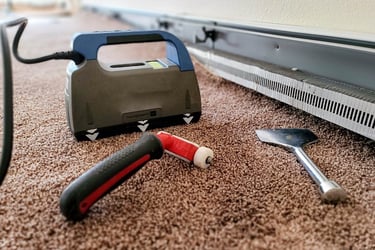carpet repair tools on repaired carpet