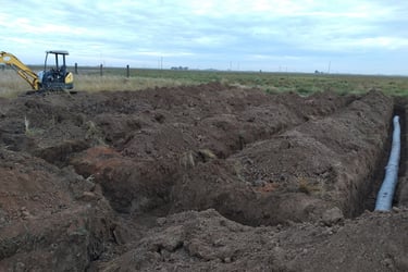 Ropesville texas Leach field Excavation by a john Deere 306 Backhoe