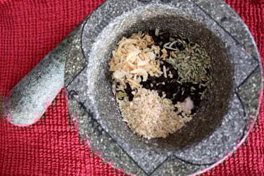 ingredients for Father;s Day steak rub in a mortar and pestle