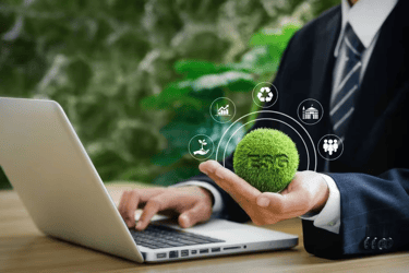 a man in a suit and tie dyes a green ball of grass