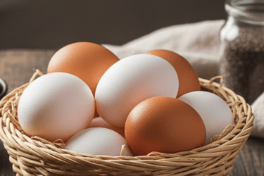 a basket of eggshells in a basket on a table
