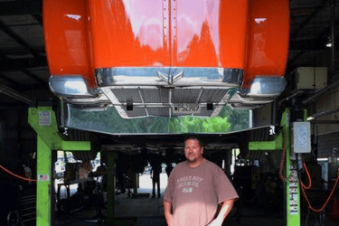 Dad Under Red Truck