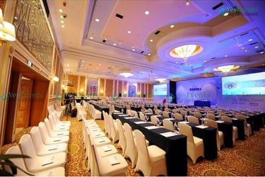 a large room with a long table and chairs