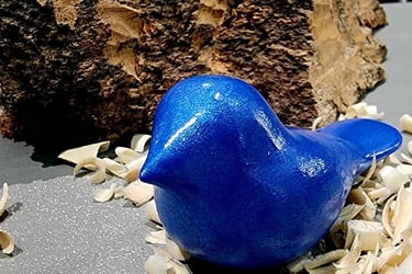 comfort bird hand carved by Tom Anstett