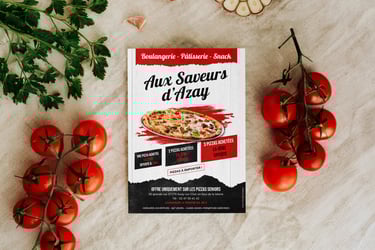 flyer aux saveurs d'azay présenté sur un plan de travail de cuisine