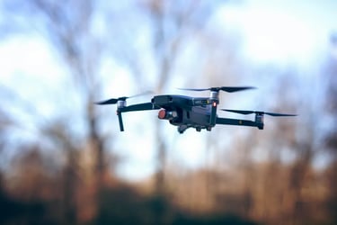 dji mavic 3 drone in mid air taking photographs