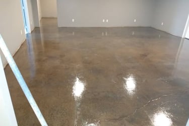 a room with a large floor plan and a white wall