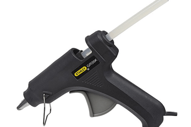 Mini hot melt glue stick in a Stanley glue gun