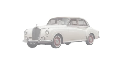 A white classic Bentley S-series car, likely a Bentley S1 or S2.