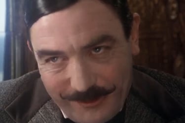 Albert Finney as Hercules Poirot