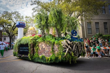 Hyundai garden parade float featuring lush greenery and trees during a St. Patrick's Day celebration in Savannah.