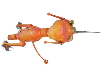 Orange metal creature sculpture named Needlenose by artist Tal Avitzur.